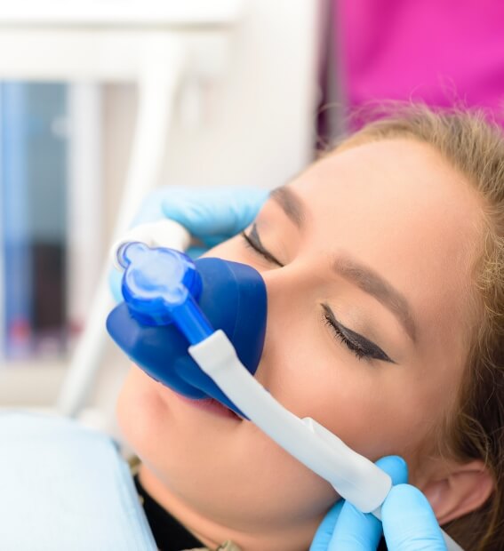 Relaxed patient under nitrous oxide dental sedation